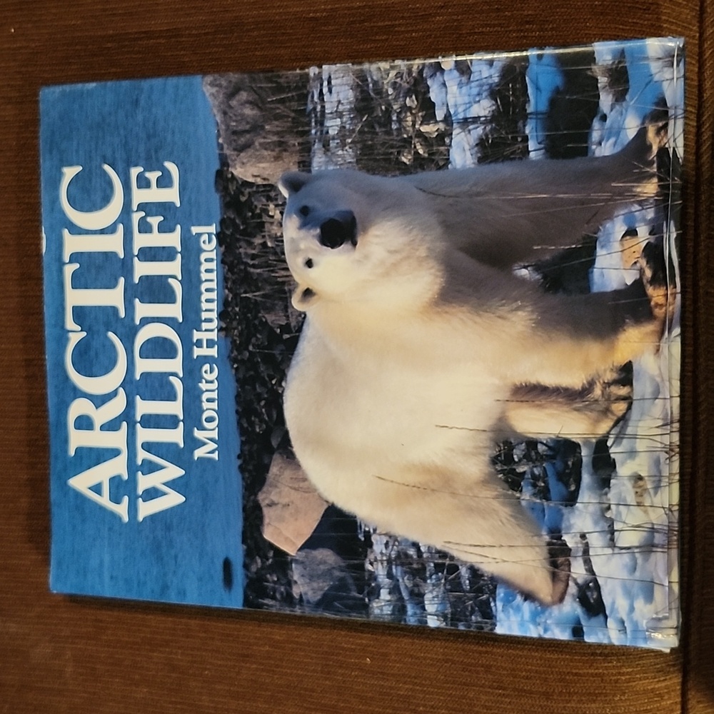 Arctic Wildlife Hardcover Book by Monte Hummel